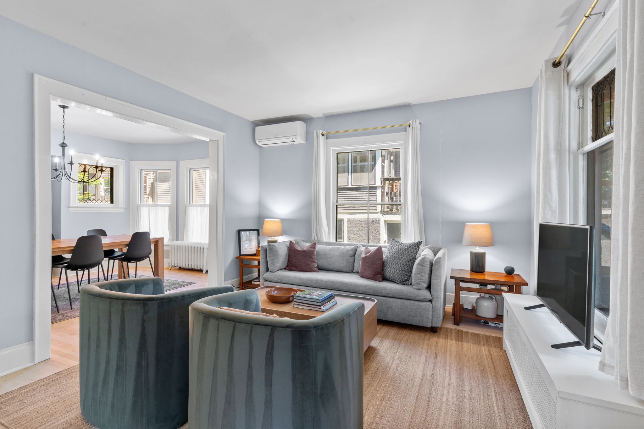 Living room with sofa and lounge chairs